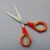 Student scissors with textured non-slip TPR handle