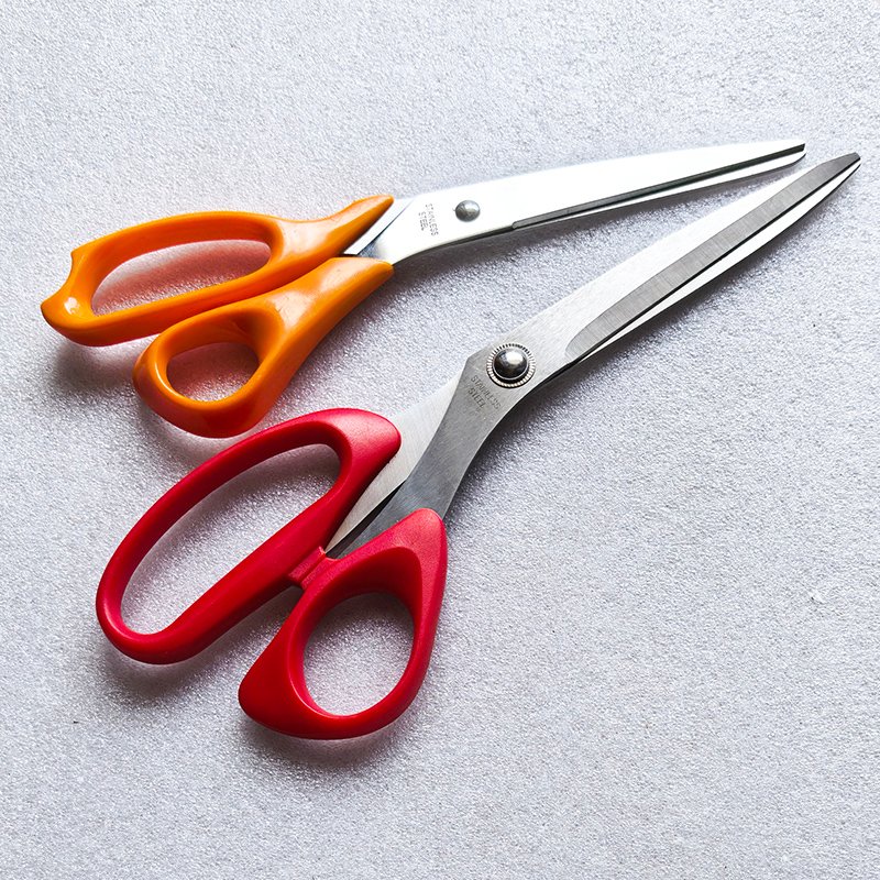 Stainless steel scissors with mirror finish blade